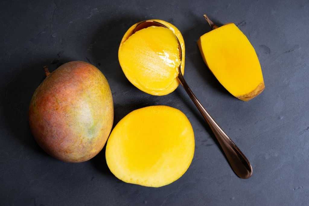 Scooping Mango With Spoon